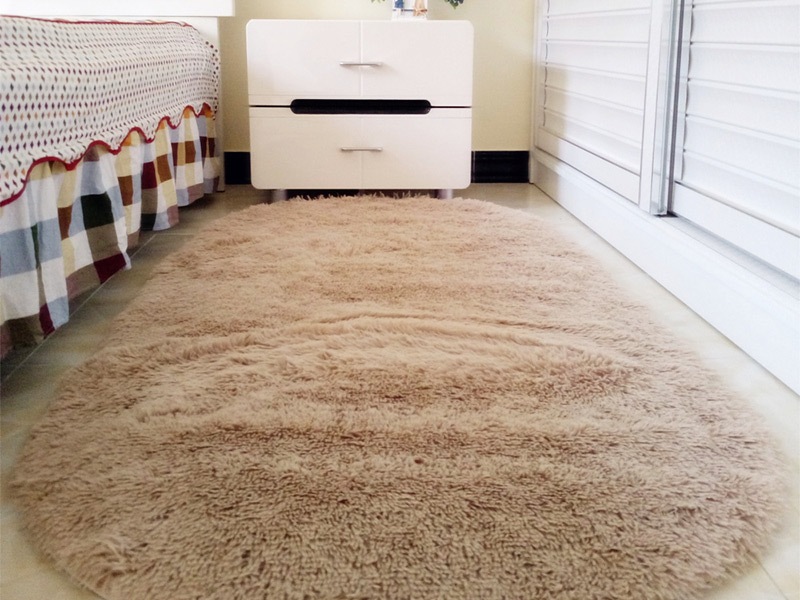 Овальный ковер в спальню